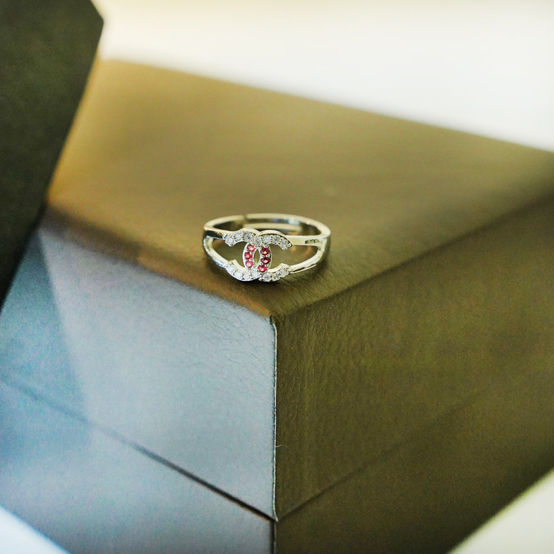 Chic Silver Ring with Red Gem Accents